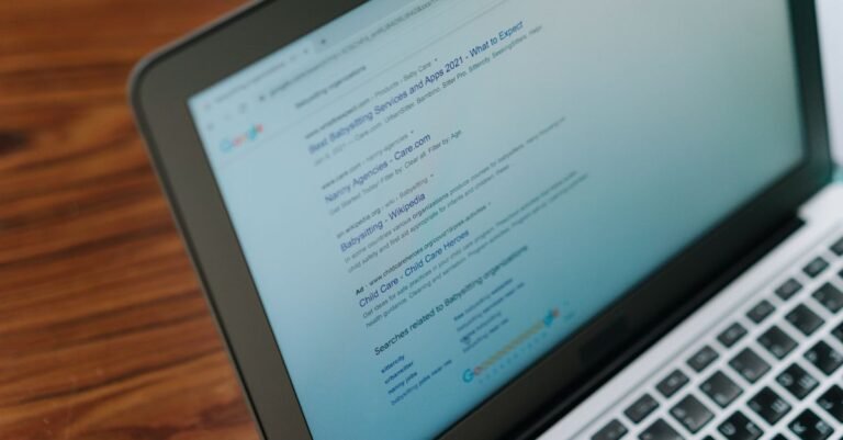 Search engine results displayed on a laptop during SEO research