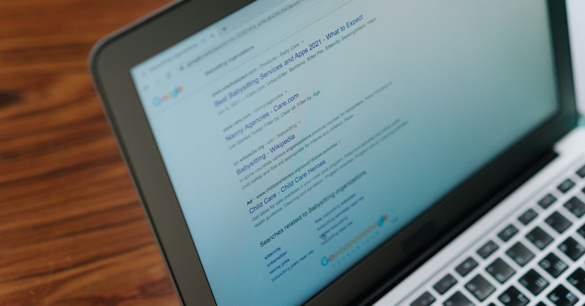 SEO research and website analysis on a laptop