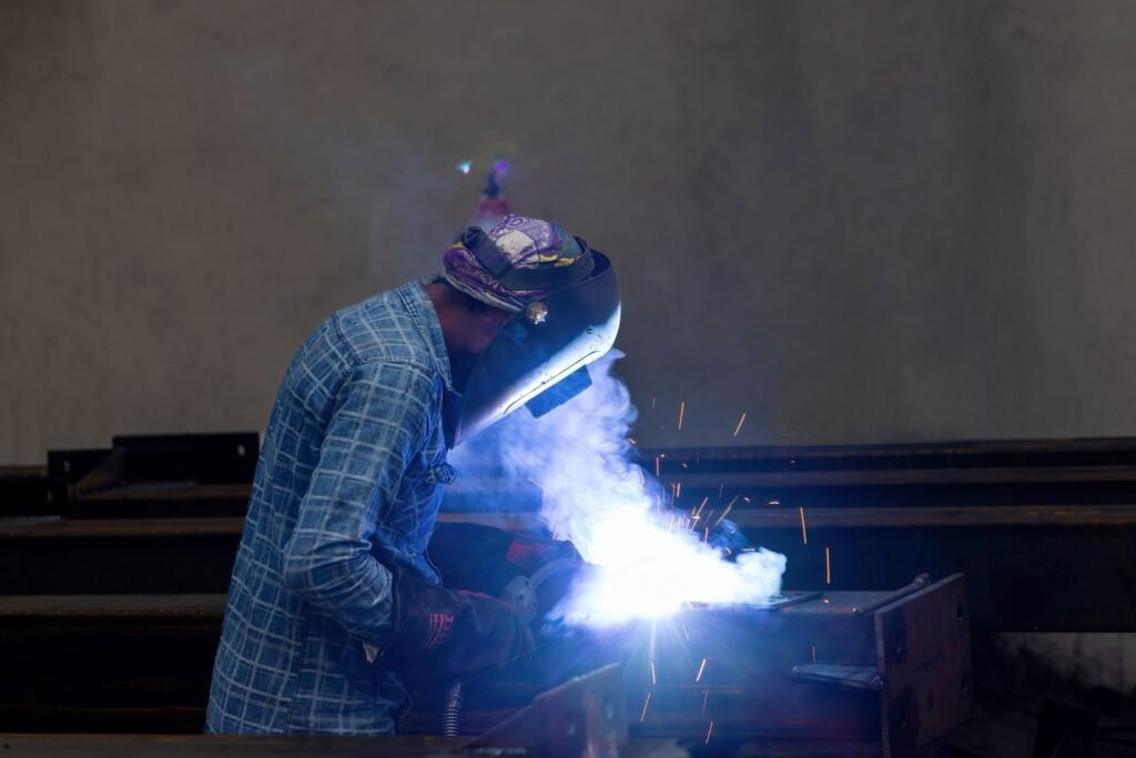 Industrial welder representing Salem manufacturing businesses in a local SEO guide