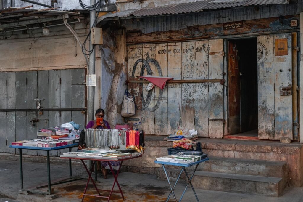 Tamil Nadu street vendor outside a local shop