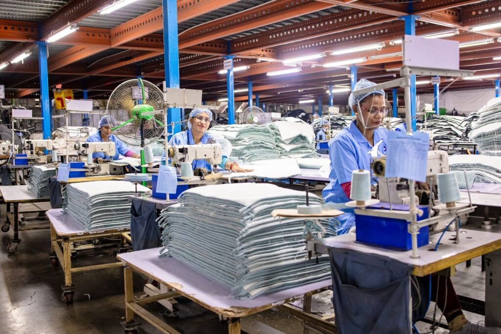 Workers in a Tiruppur-style textile factory for a local SEO business guide