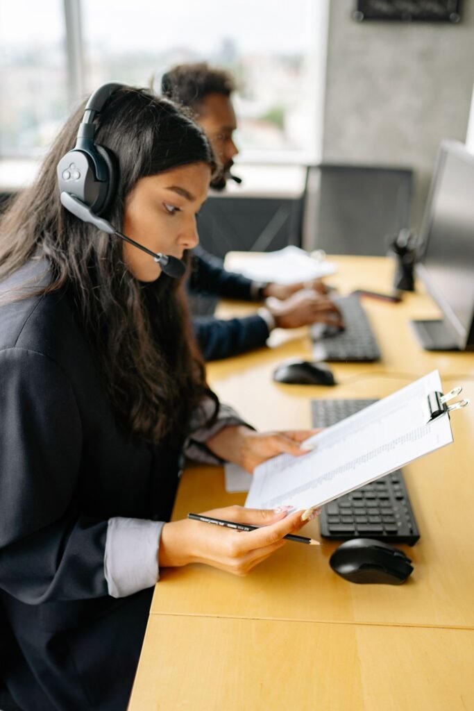 Customer support team handling enquiries in an office
